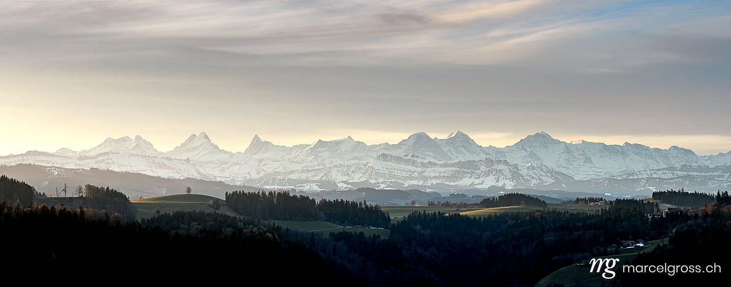. panoramic view of the Bernese Alps and the hills of Emmental Valley in front. Marcel Gross Photography