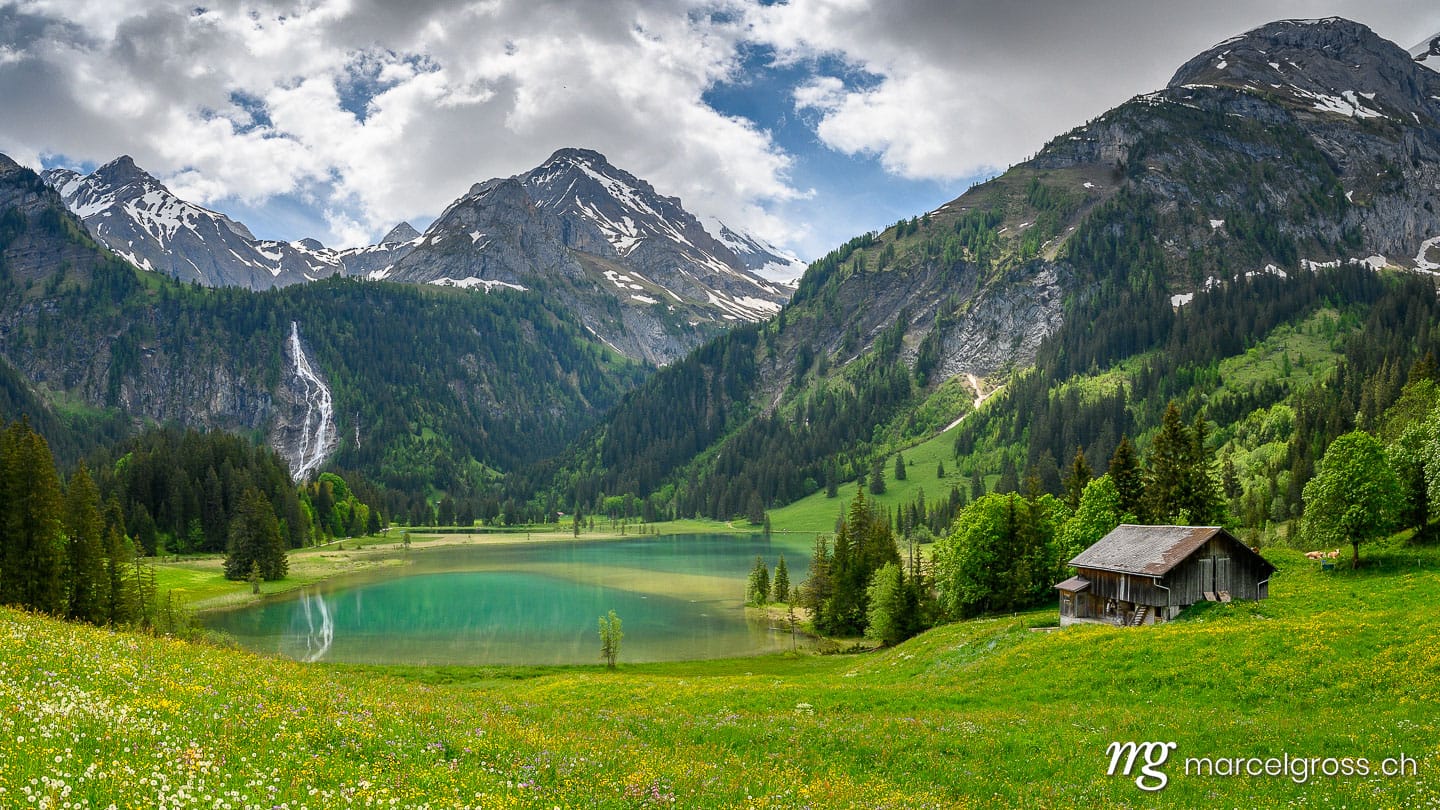 . idyllic Lake Lauenensee with Wildhorn in spring, Bernese Alps, Switzerland. Marcel Gross Photography