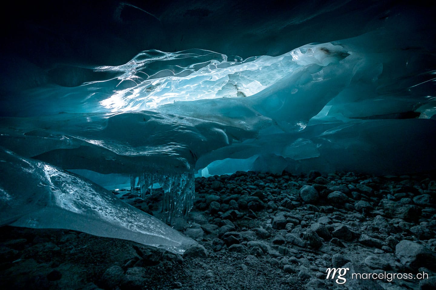 . ice cave in Glacier in Switzerland. Marcel Gross Photography