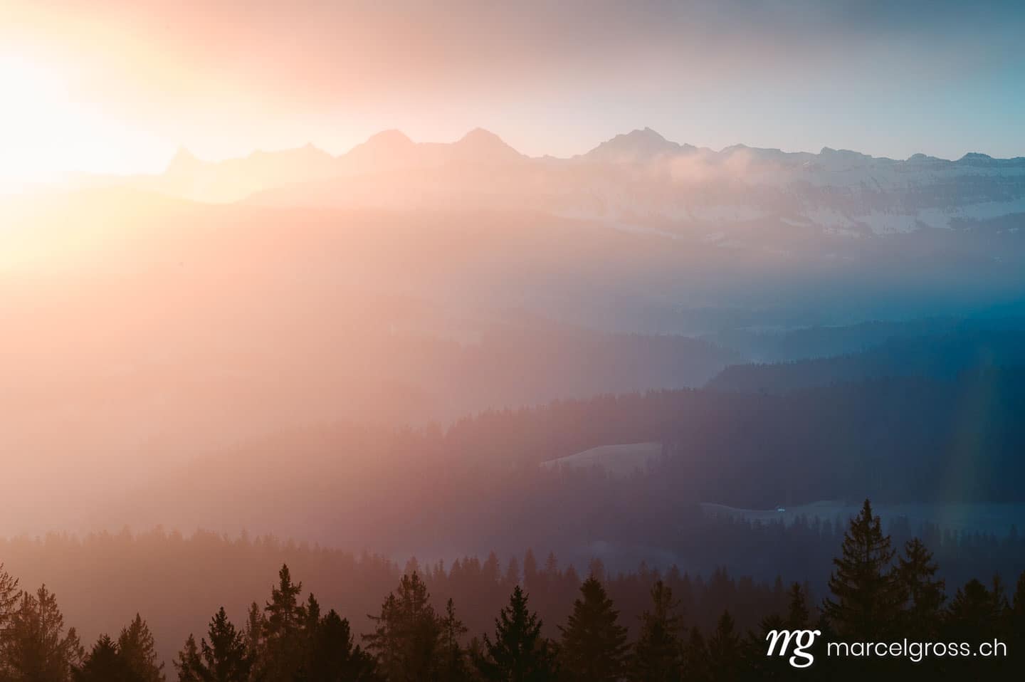 . morning light on the Bernese Alps with the hills of Emmental in front. Marcel Gross Photography