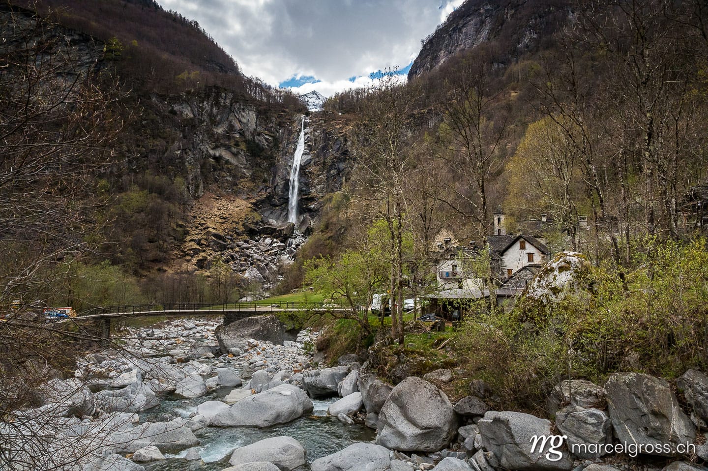 Tessin Bilder. picturesque town of Foroglio with the impressive waterfall in spring, Valle di Bavona, Ticino. Marcel Gross Photography