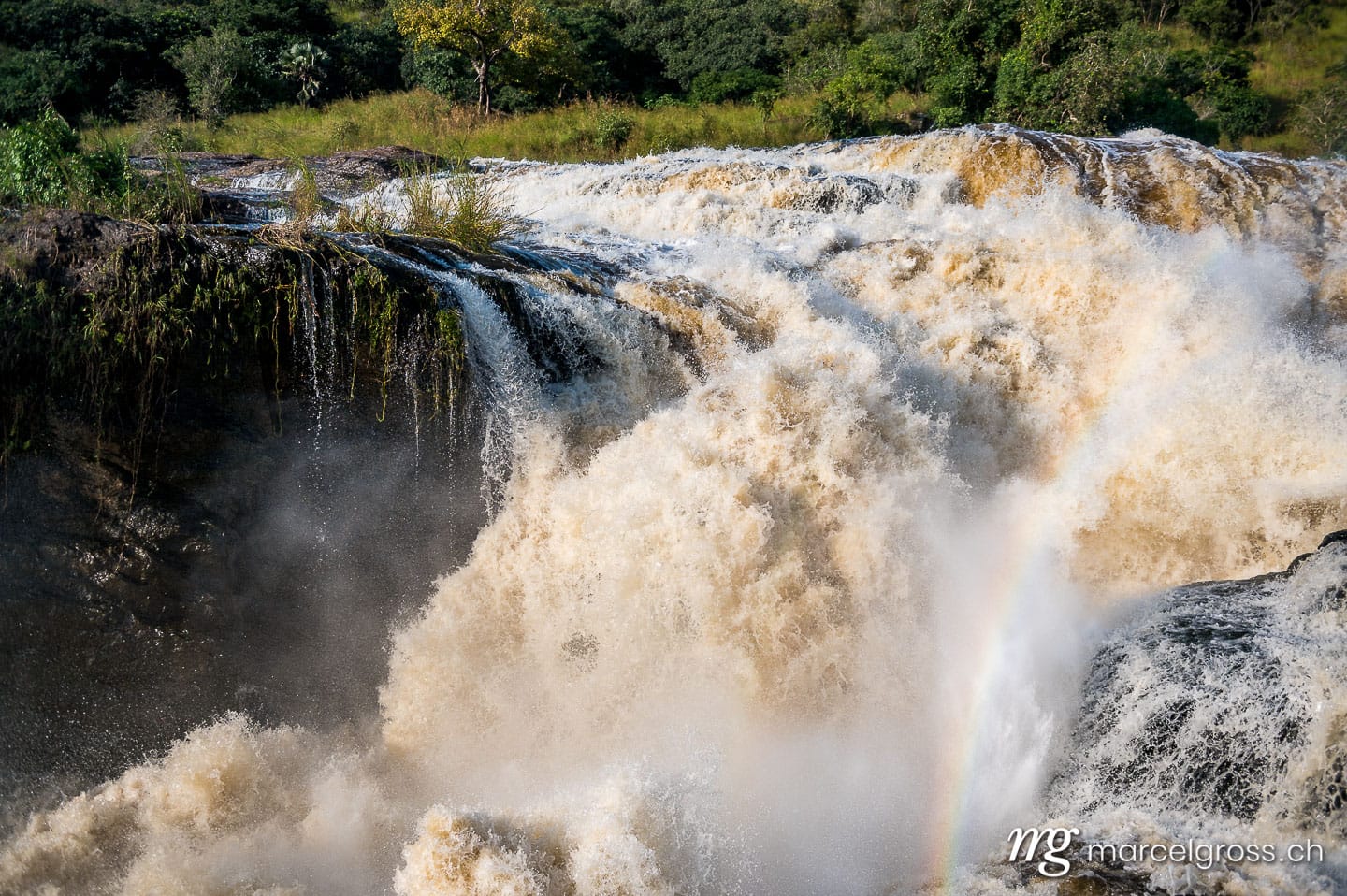 Uganda Bilder. thundering waterfall in Murchison Falls, Uganda. Marcel Gross Photography