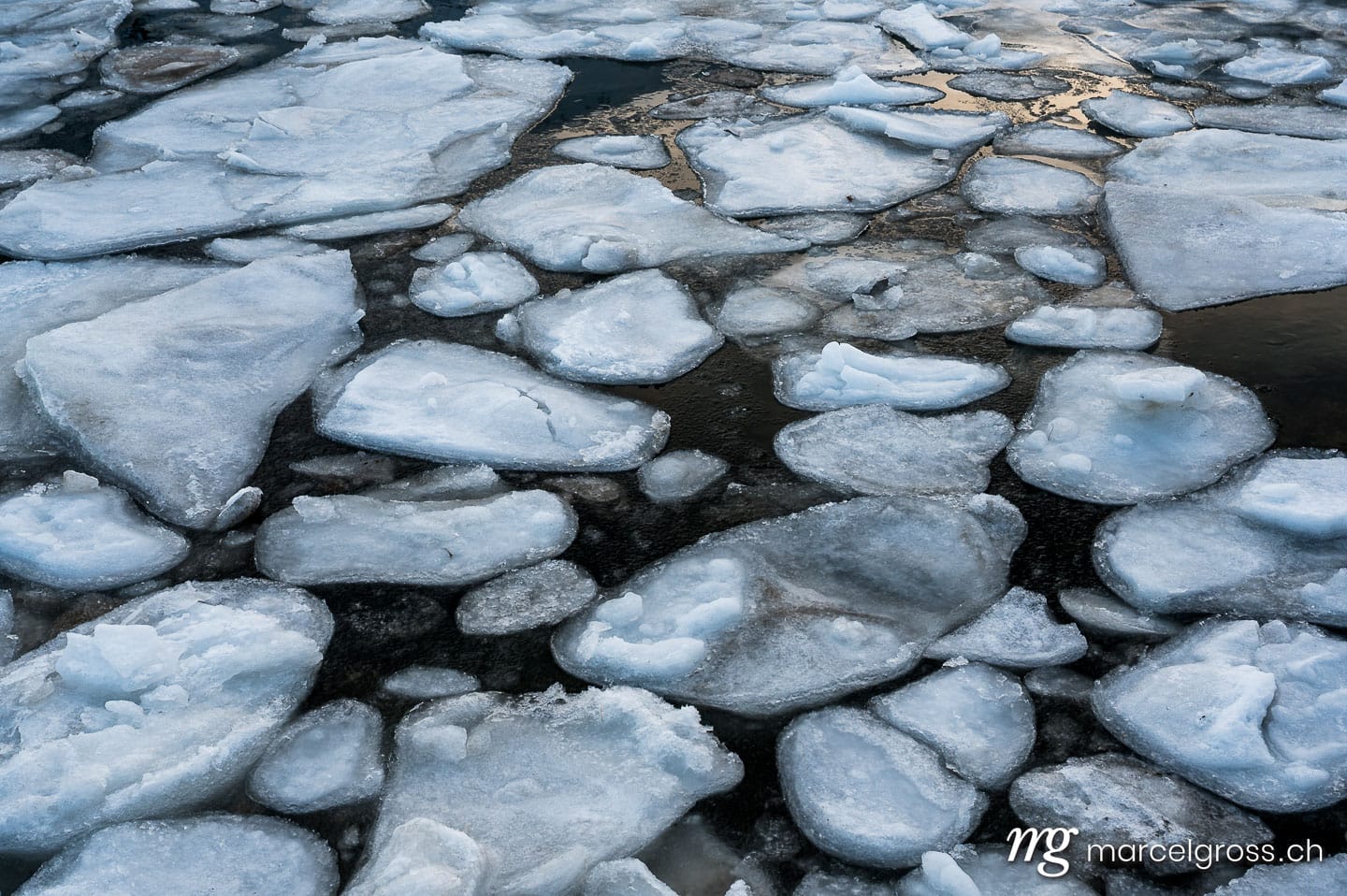 Sea ice floes at Kvalvika Beach, Ytresand, Northern Norway in winter. Lofoten Bilder (c) Marcel Gross Photography