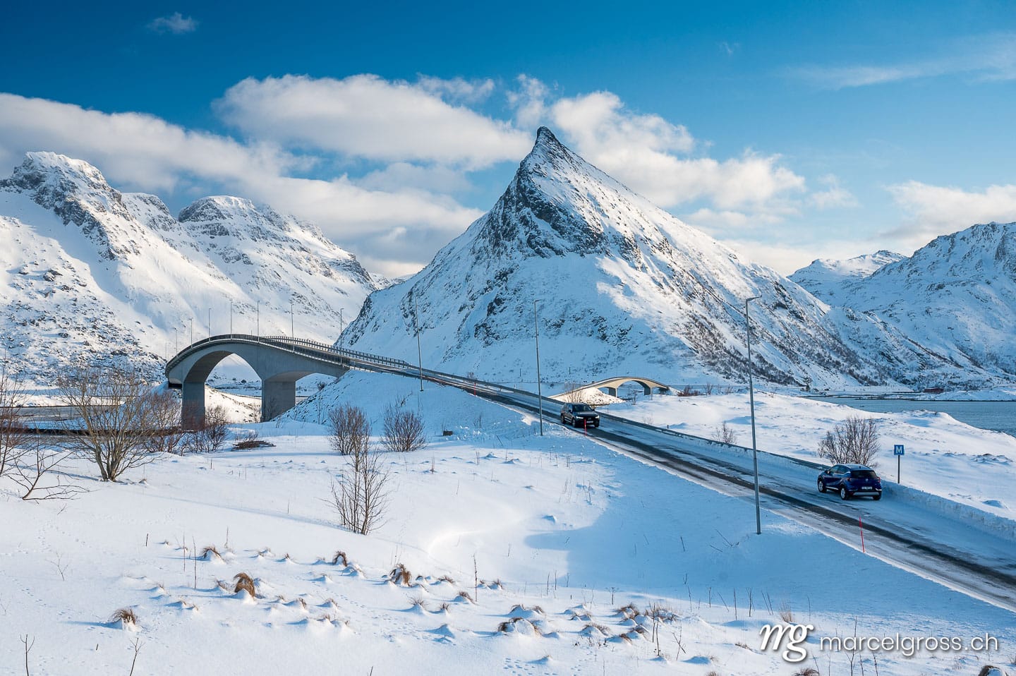 Winter Bridge and Mountain Landscape near Kvalvika Beach, Northern Norway. Lofoten Bilder (c) Marcel Gross Photography