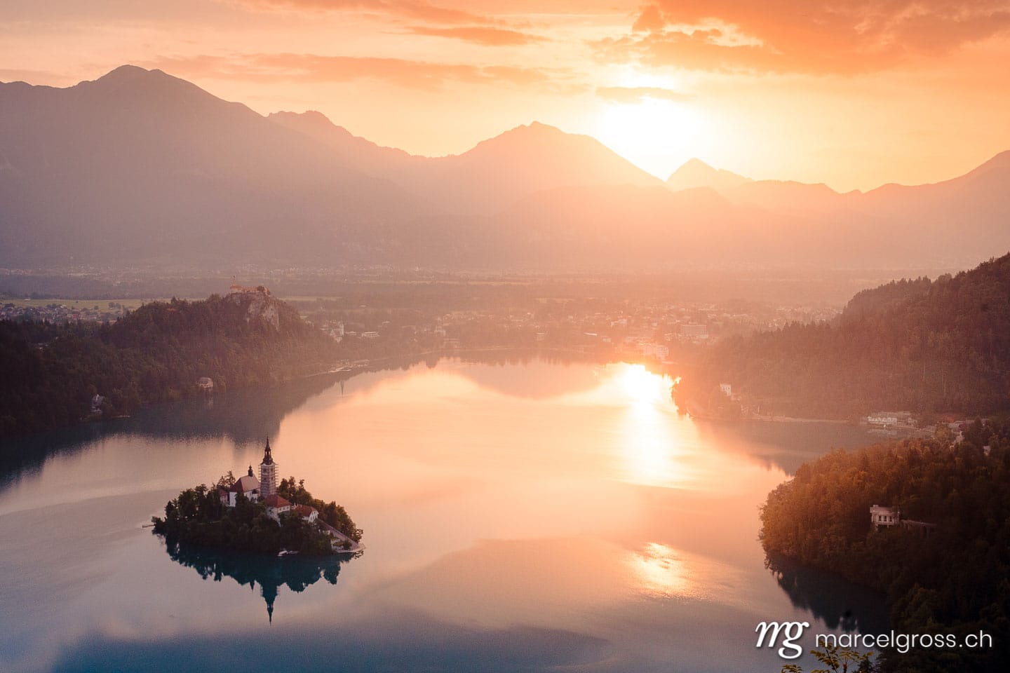 slovenia pictures. Sunrise over Lake Bled with famous island with church. Marcel Gross Photography