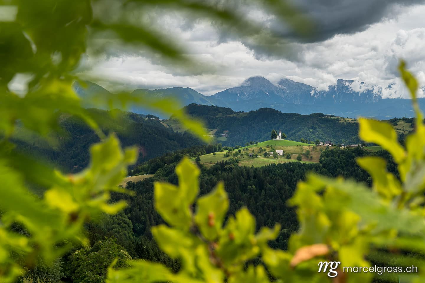 slovenia pictures. church on top of a hill in Slovenia. Marcel Gross Photography
