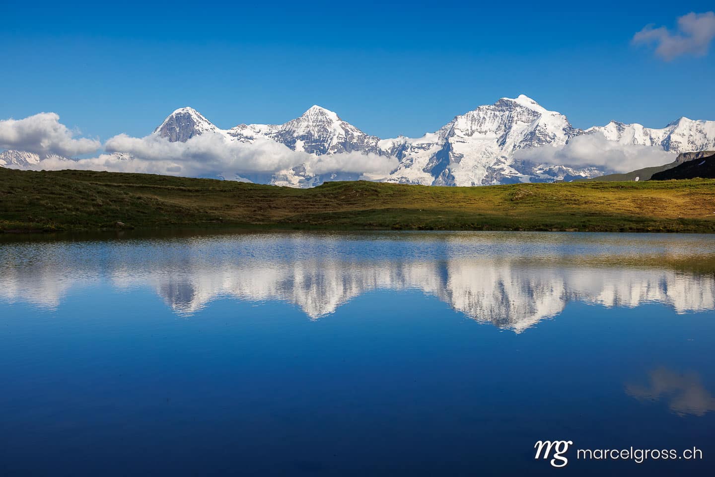 Spiegelung von Eiger, Mönch und Jungfrau in Bergsee. Berner Oberland Bilder (c) Marcel Gross Photography