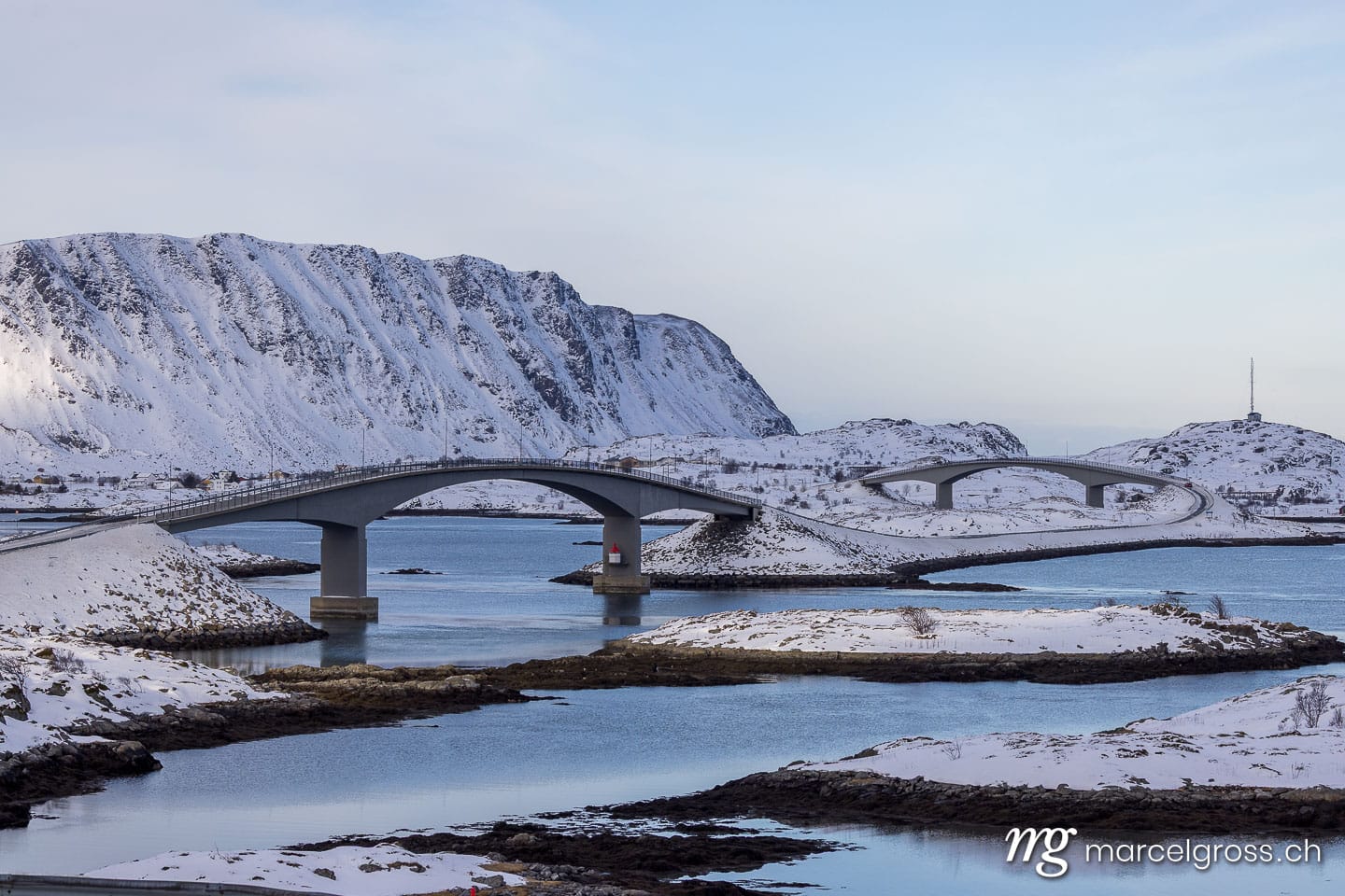 Winter bridge over snowy fjord in Northern Norway, Scandinavia. Lofoten Bilder (c) Marcel Gross Photography