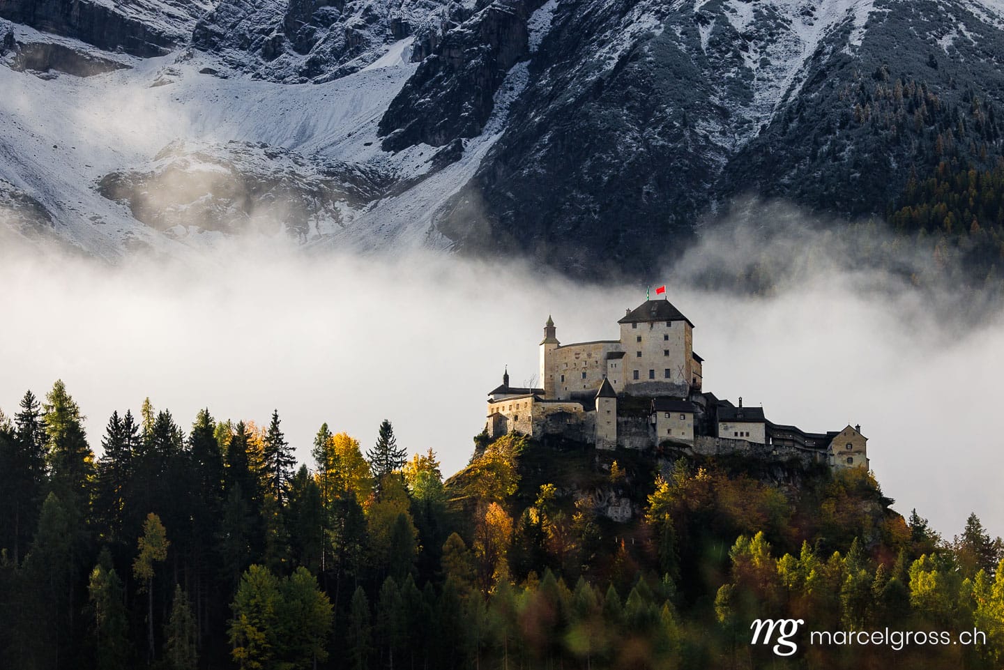 Engadin Bilder. castle of Tarasp near Scuol in Engadin in autumn. Marcel Gross Photography